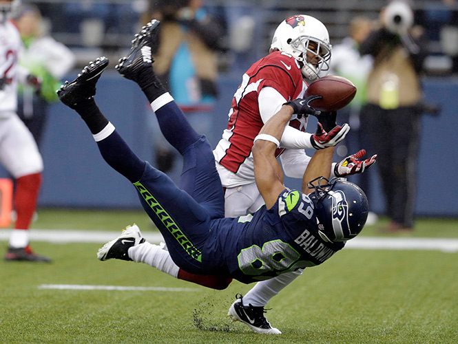 Seattle interceptó cuatro envíos de Palmer, quien se reivindicó con el pase del triunfo. (AP) Seattle interceptó cuatro envíos de Palmer, quien se reivindicó con el pase del triunfo. (AP)