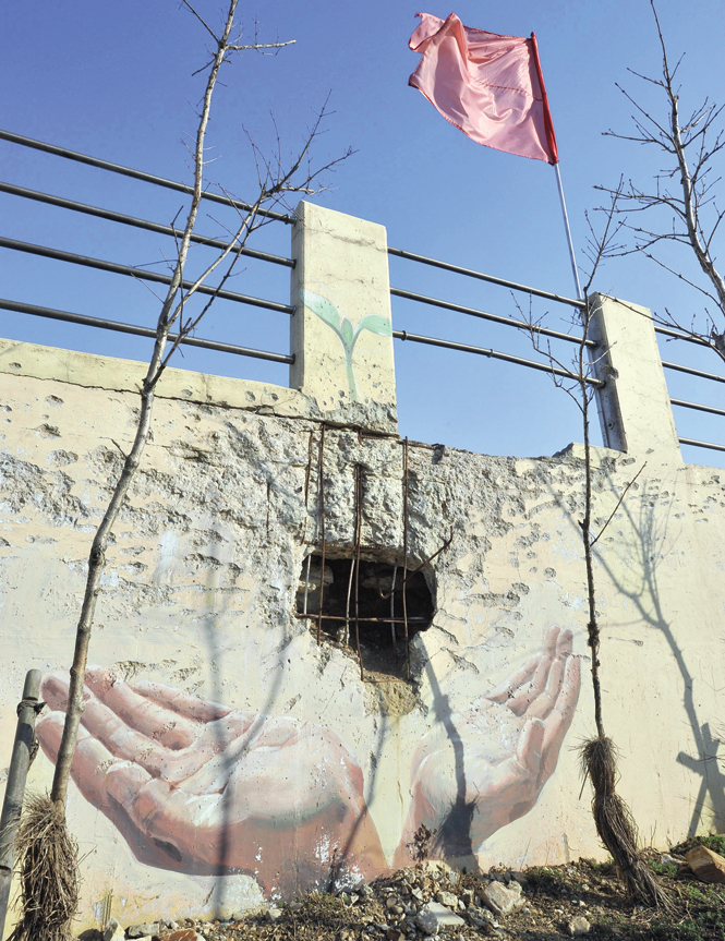 Muro dañado durante un ataque con artillería que Corea del Norte perpetró contra Sudcorea en 2010. Foto: AFP