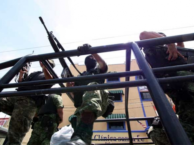 Comando mata a 5 en plantón en Michoacán Comando mata a 5 en plantón en Michoacán