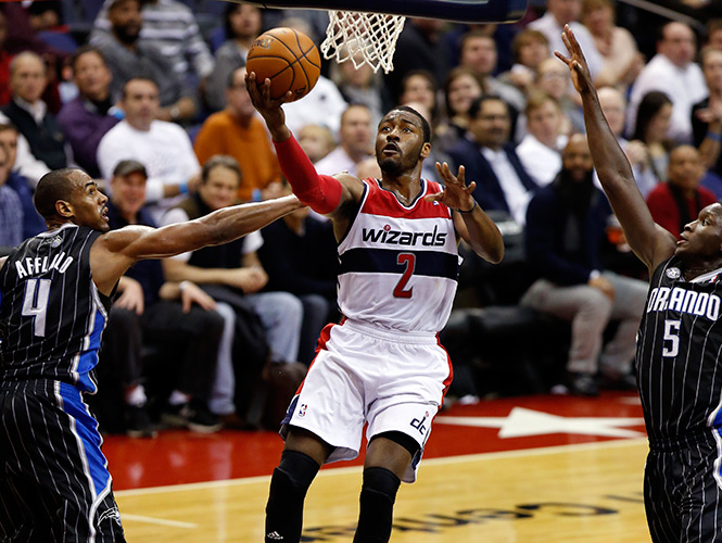 John Wall aportó 16 tantos y 13 asistencias. (AP)