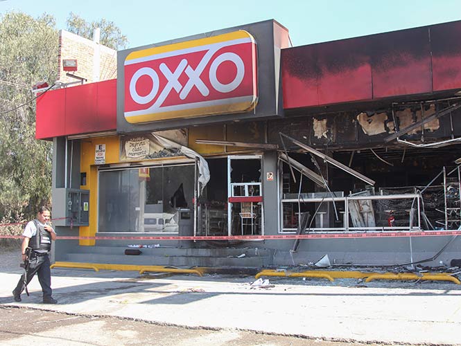 Son cinco tiendas atacadas en Hidalgo y Edomex: Femsa. Foto: Cuartoscuro Son cinco tiendas atacadas en Hidalgo y Edomex: Femsa. Foto: Cuartoscuro