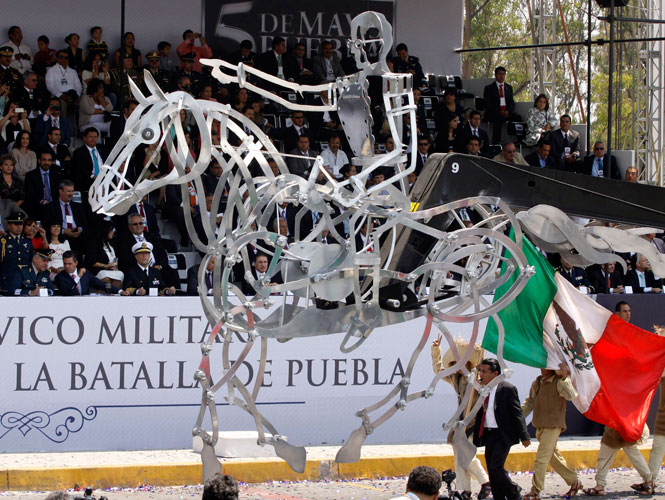 El desfile conmemorativo a la Batalla del 5 de Mayo en Puebla recuperó su perfil tradicional El desfile conmemorativo a la Batalla del 5 de Mayo en Puebla recuperó su perfil tradicional